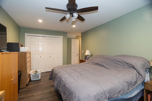 bedroom with dark wood-style floors, recessed lighting, a closet, and a ceiling fan