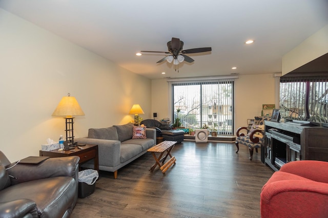 living area with a ceiling fan, recessed lighting, and wood finished floors