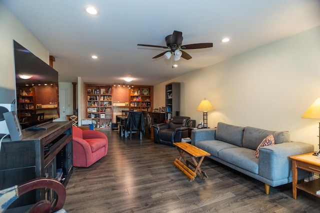 living room with wood finished floors, a ceiling fan, and recessed lighting