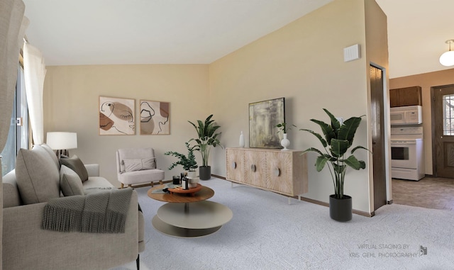 living area featuring vaulted ceiling, visible vents, baseboards, and carpet floors