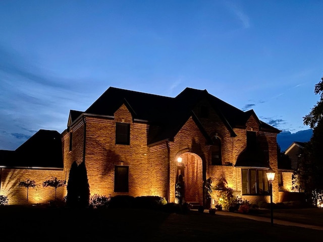 view of front facade featuring brick siding