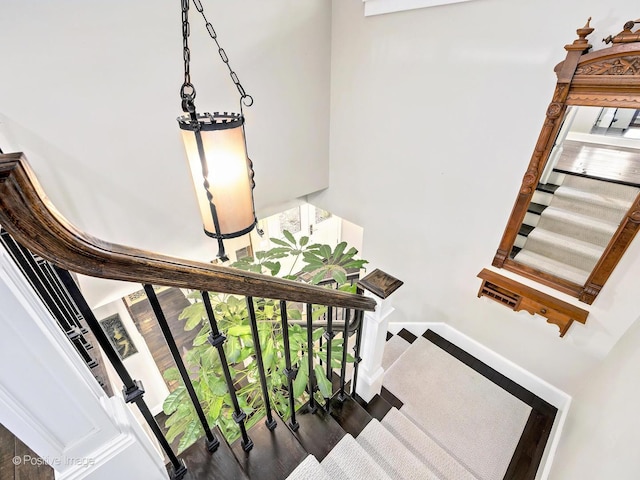 stairway featuring baseboards