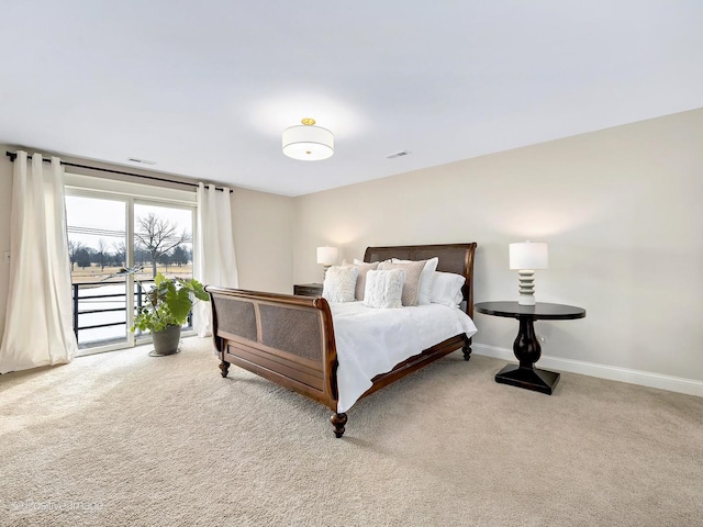 bedroom featuring carpet floors, access to exterior, visible vents, and baseboards