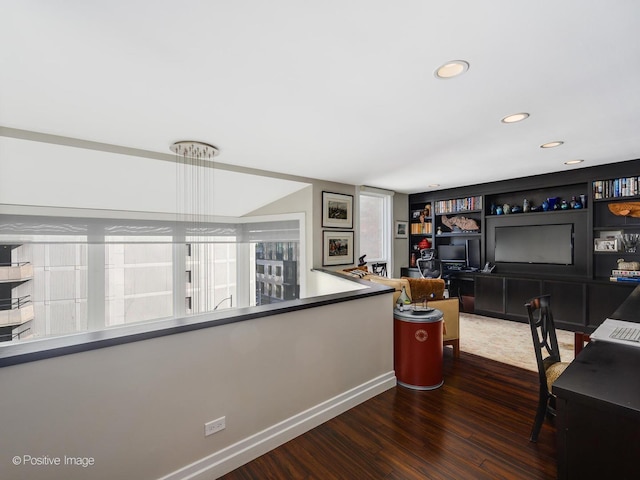 office space featuring recessed lighting, baseboards, and wood finished floors