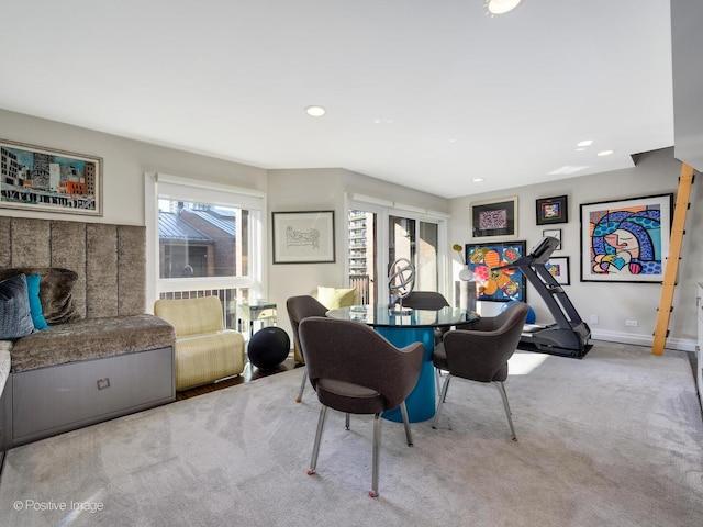 interior space with baseboards and recessed lighting