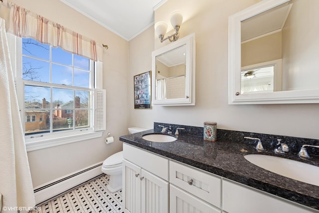 full bath featuring toilet, a baseboard radiator, ornamental molding, and a sink