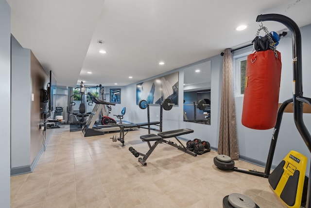 interior space featuring baseboards and recessed lighting