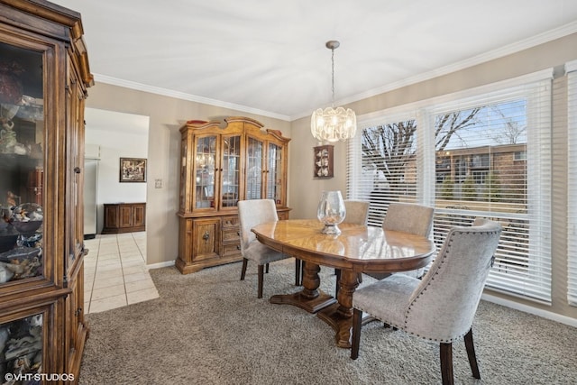 dining space featuring light tile patterned floors, light carpet, crown molding, baseboards, and an inviting chandelier