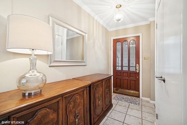 foyer featuring crown molding and baseboards