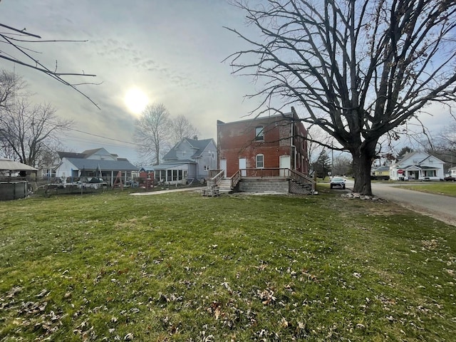 view of yard featuring a residential view