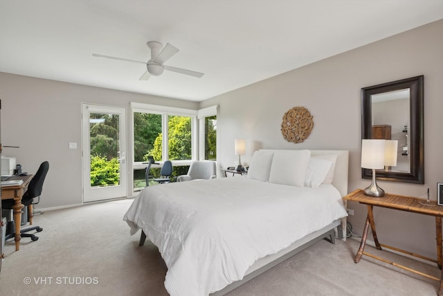 bedroom with light carpet, access to exterior, ceiling fan, and baseboards