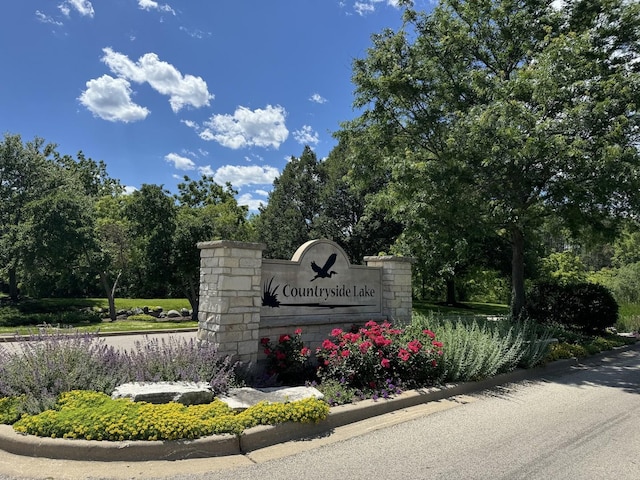 view of community sign