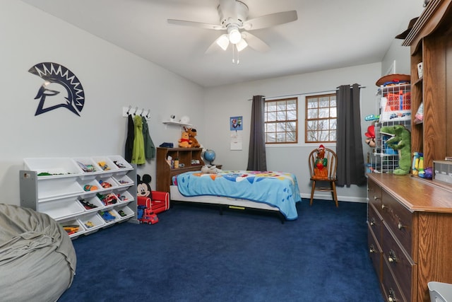 bedroom featuring ceiling fan, dark carpet, and baseboards