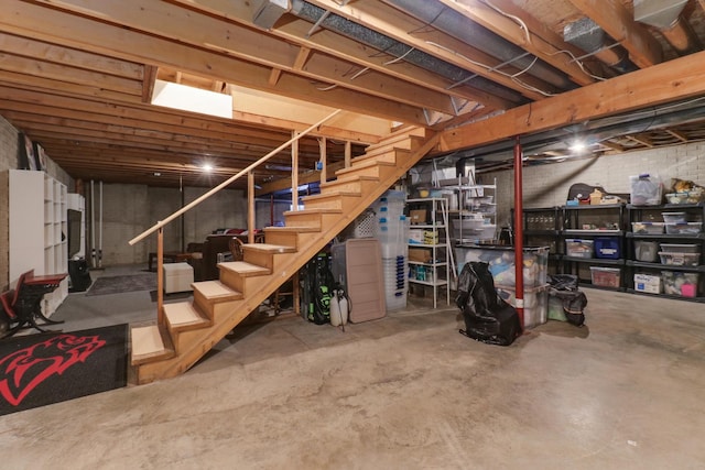 unfinished basement with stairway