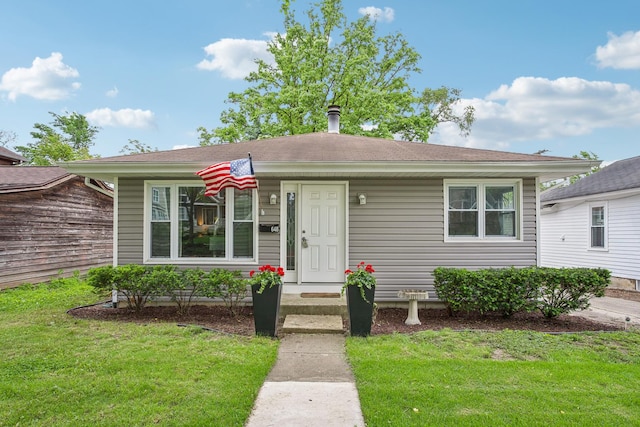 view of front of property with a front yard