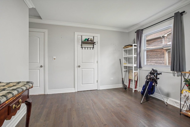 rec room featuring ornamental molding, baseboards, and wood finished floors