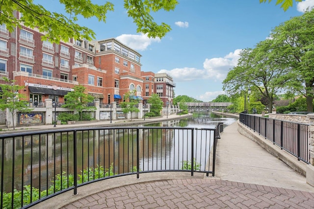 view of patio featuring a water view