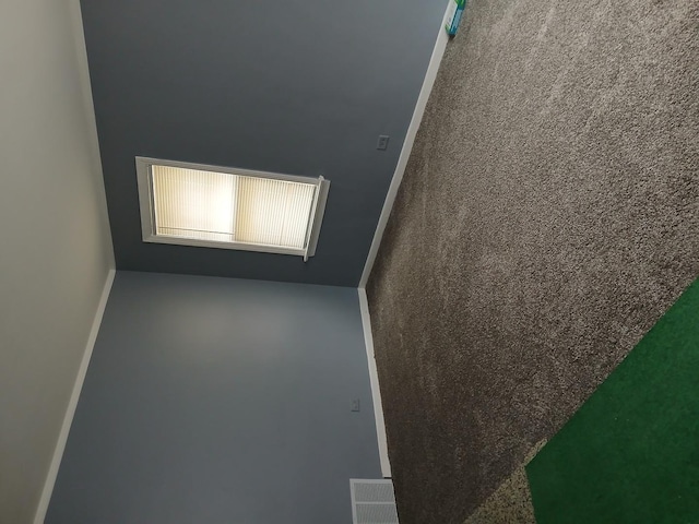 empty room with baseboards