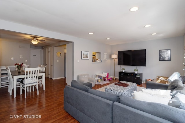 living area with recessed lighting, a ceiling fan, and wood finished floors