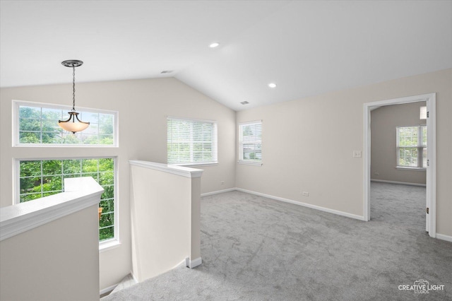 2018 Fulham Dr Unit 2018, Naperville, IL 60564 - unfurnished room with healthy amount of natural light, carpet flooring, baseboards, vaulted ceiling, and recessed lighting