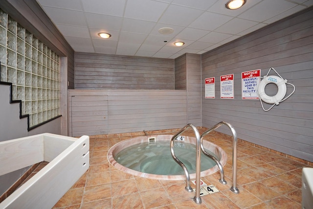 view of pool featuring an indoor in ground hot tub