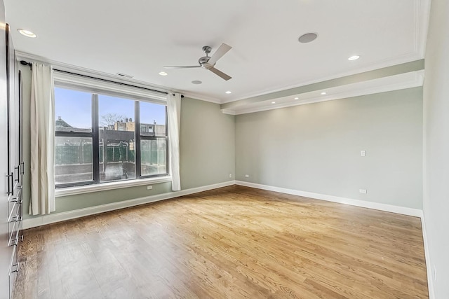 unfurnished room featuring a ceiling fan, baseboards, light wood finished floors, recessed lighting, and ornamental molding