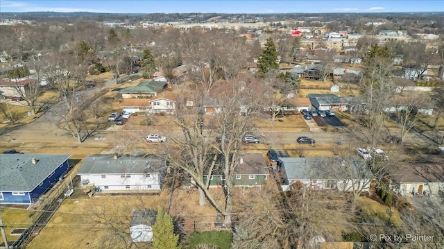 birds eye view of property with a residential view