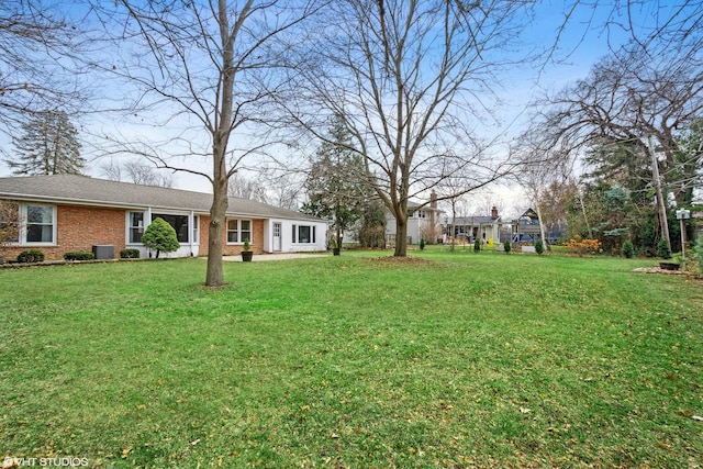 view of yard featuring central AC