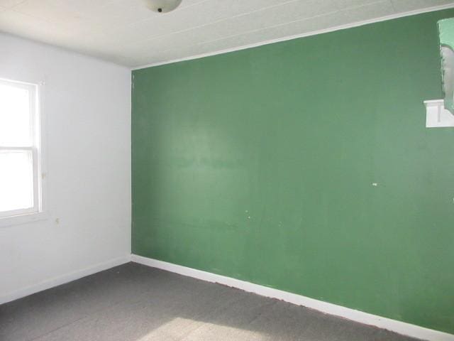 525 Price Ave, Calumet City, IL 60409 - spare room featuring carpet floors and baseboards