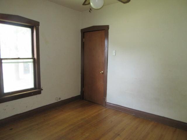 525 Price Ave, Calumet City, IL 60409 - empty room featuring baseboards, ceiling fan, and wood finished floors