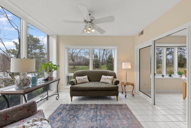sunroom / solarium featuring healthy amount of natural light