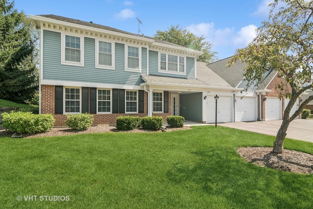 view of front of home featuring driveway, a garage, a front yard, and brick siding