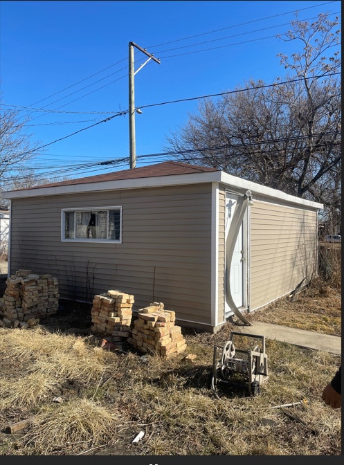 view of outbuilding featuring an outdoor structure