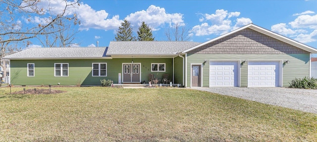 single story home featuring gravel driveway, a front yard, an attached garage, and a shingled roof