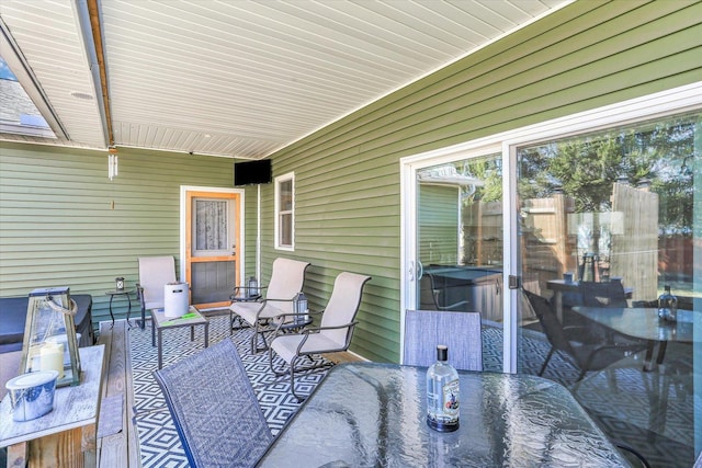 view of patio featuring outdoor dining area