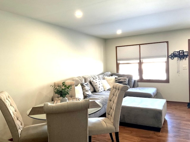 living room with recessed lighting and dark wood finished floors