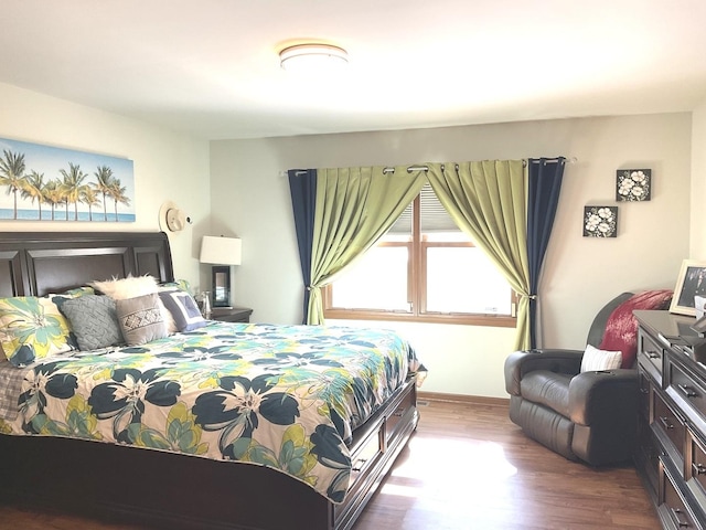 bedroom with wood finished floors