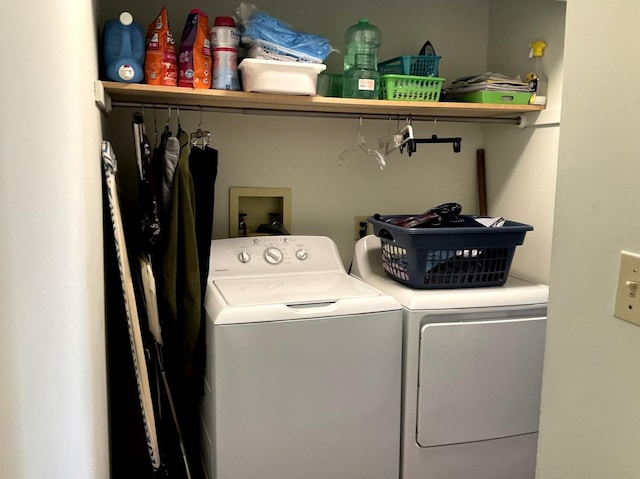 washroom with laundry area and separate washer and dryer