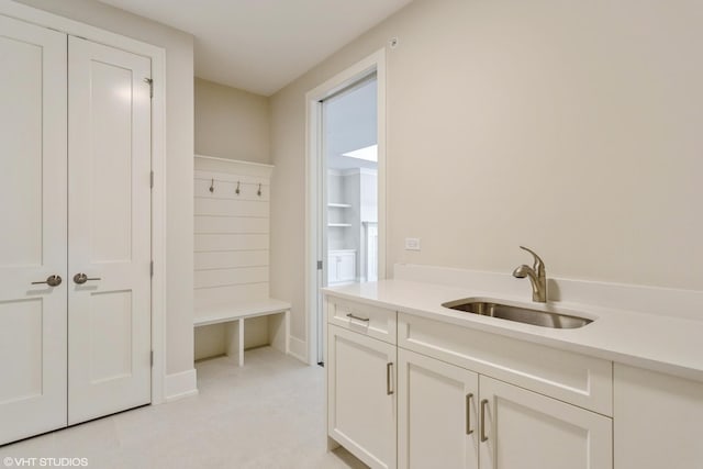 mudroom featuring a sink