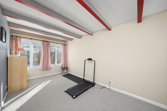 exercise area with carpet floors and baseboards