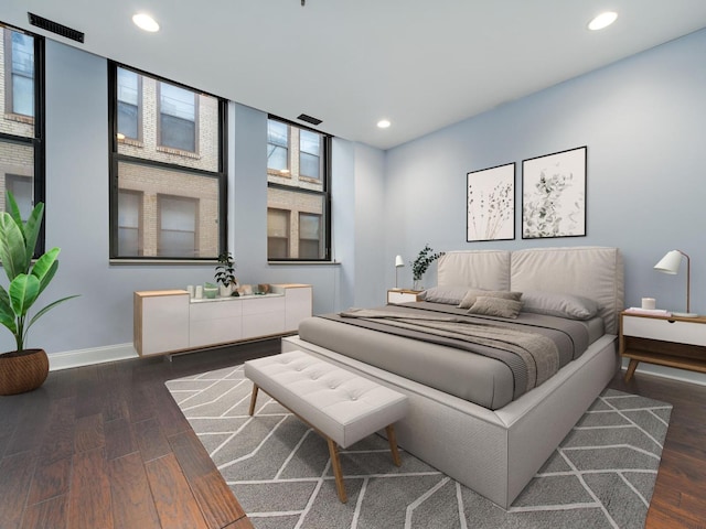 bedroom featuring recessed lighting, baseboards, and dark wood-style floors