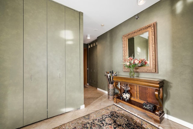 501 N Clinton St Unit 1705, Chicago, IL 60654 - hallway featuring light tile patterned floors and baseboards