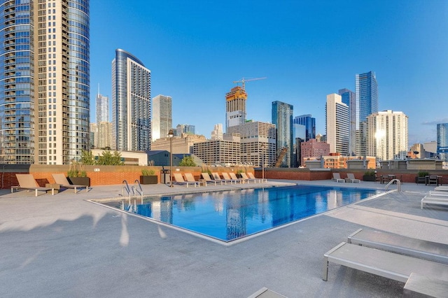 501 N Clinton St Unit 1705, Chicago, IL 60654 - community pool with a skyline view and a patio