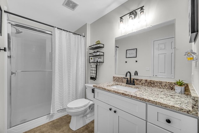 full bathroom featuring a stall shower, tile patterned flooring, vanity, and visible vents