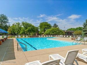 community pool featuring a patio area