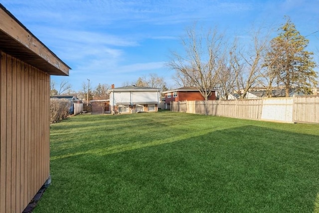 view of yard featuring a fenced backyard