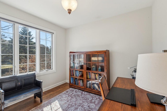 office featuring wood finished floors and baseboards