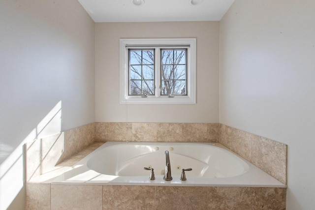 bathroom featuring a whirlpool tub