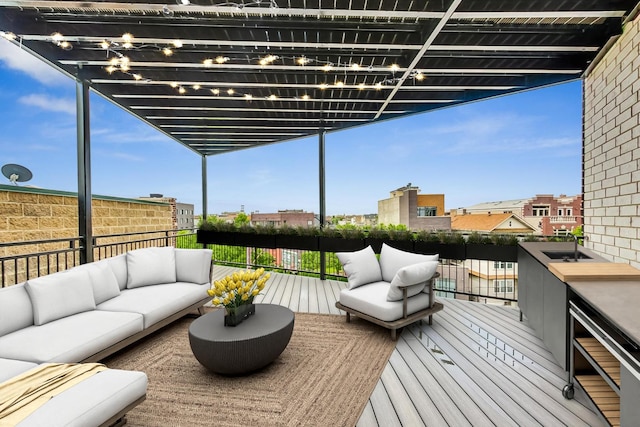 wooden terrace featuring outdoor lounge area