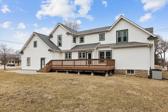 back of property with a patio, a deck, central AC, and a yard